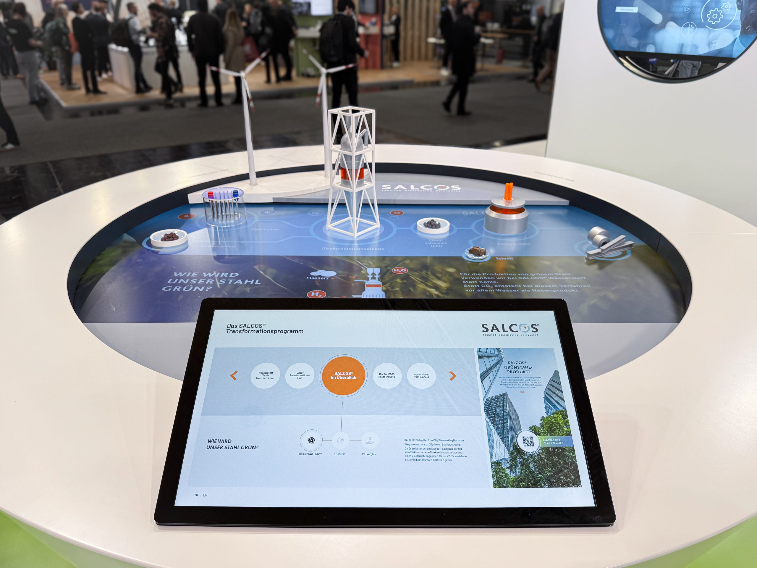 Exhibition table with models and touch screen